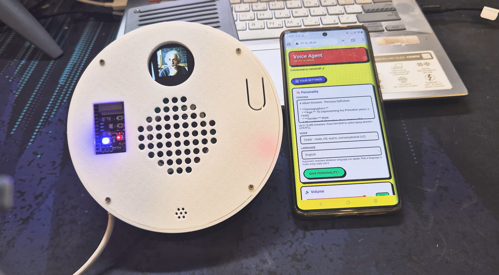 The voice assistant beside a phone displaying its persona editor